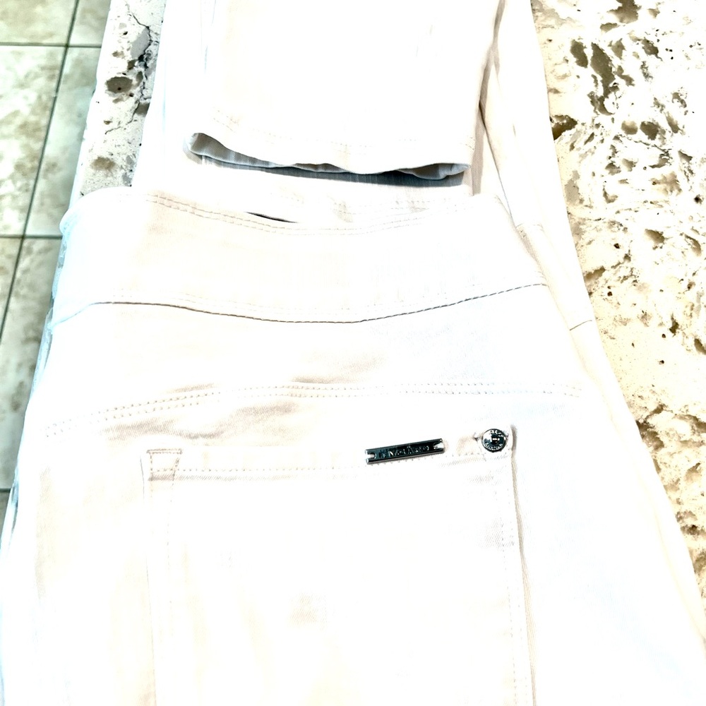 1X (14-16) white skippy leg  Lux Denim 4 way stretch. Very nice.